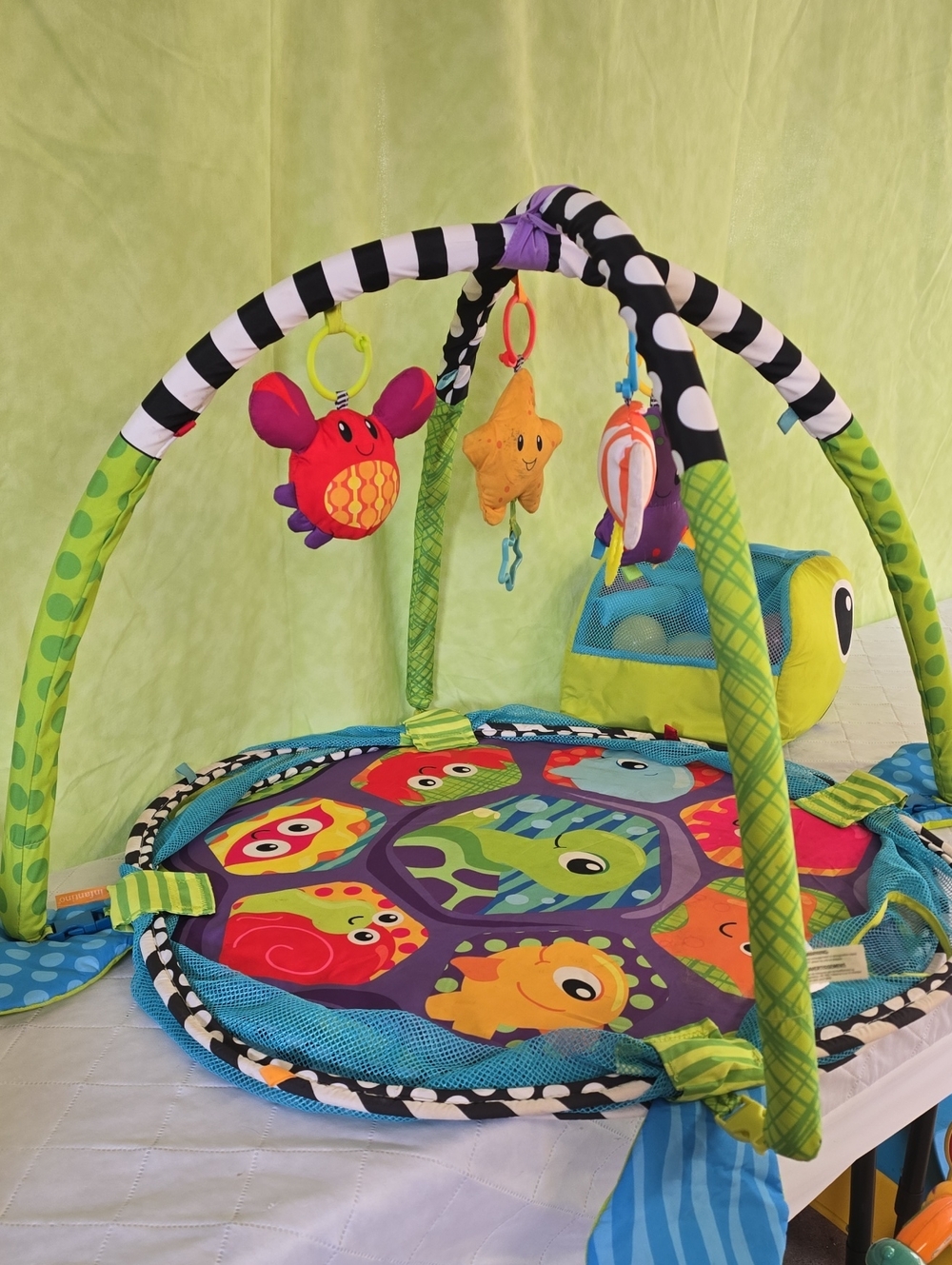 Infantino Green and Purple Baby Play Gym with Hanging Plush Toys